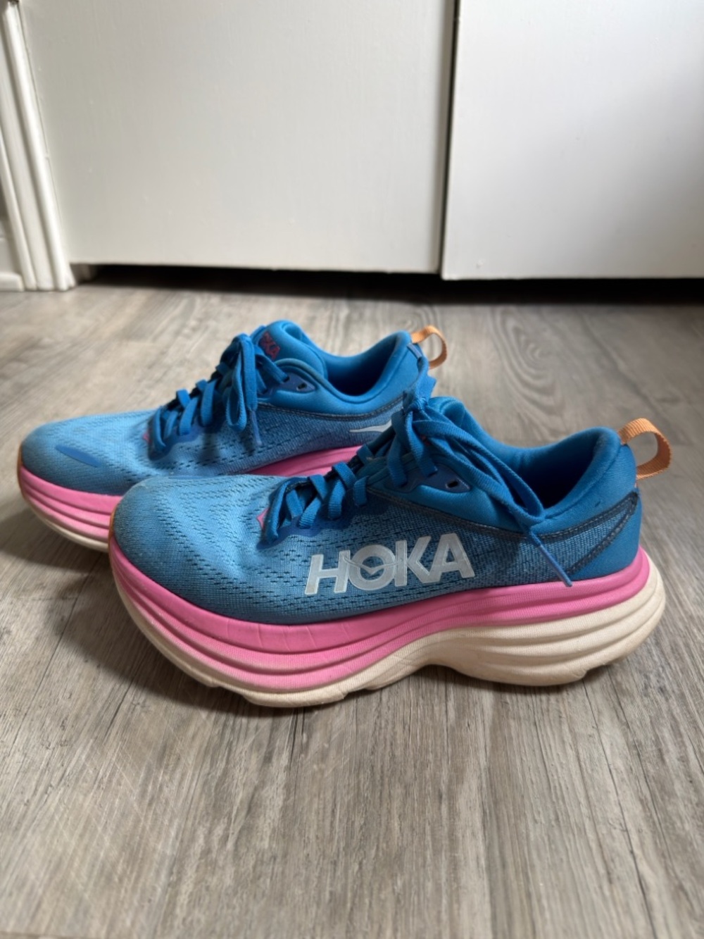 Hoka Bondi royal blue and pink sneakers